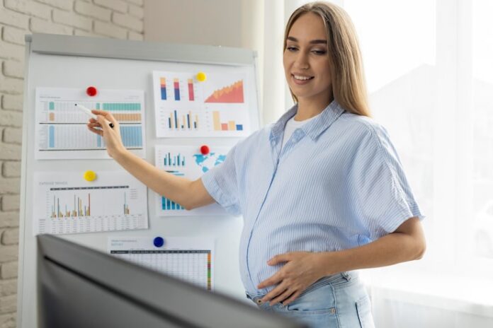 smiley-pregnant-businesswoman-giving-presentation-whiteboard_23-2148804448